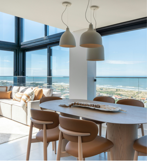 A dining area beside the balcony